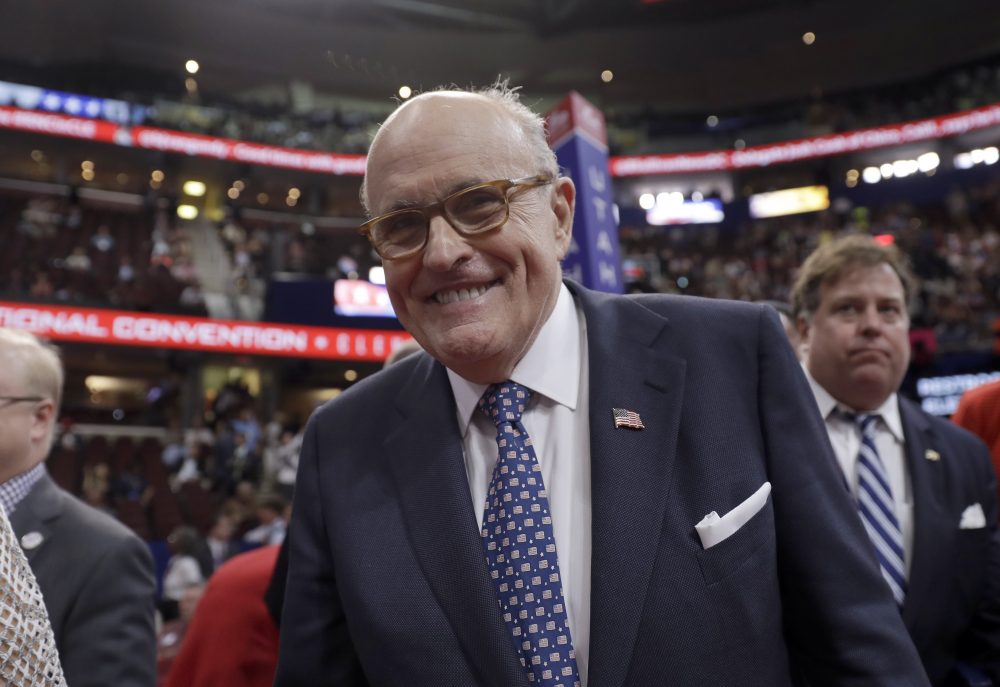 Former New York Mayor Rudy Giuliani walks around the convention floor before the evening session of the Republican National Convention in Cleveland in July 2016. (Matt Rourke/AP)