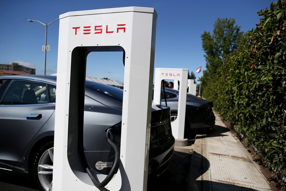 A Tesla Model S sedan is seen plugged into a new Tesla Supercharger outside of the Tesla Factory on Aug. 16, 2013 in Fremont, Calif. (Justin Sullivan/Getty Images)