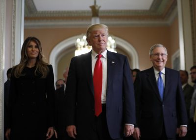 Melania Trump, and her husband President-elect Donald Trump, center, walk with Senate Majority Leader Mitch McConnell, of Kentucky, as they depart after a meeting on Capitol Hill, Thursday, Nov. 10, 2016 in Washington. (Alex Brandon/AP)