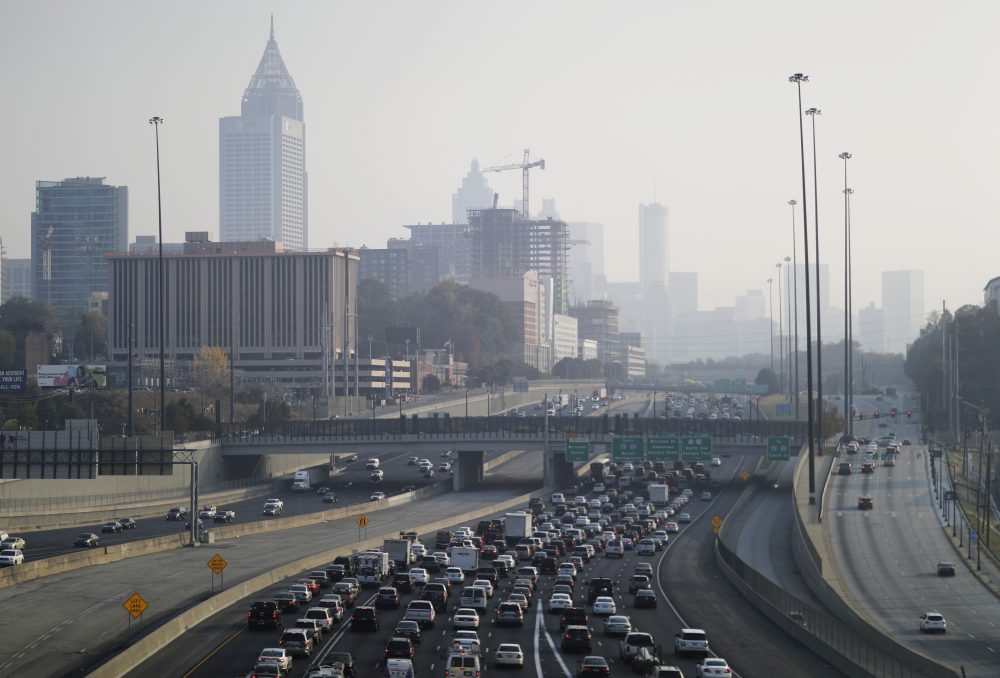 A haze hovers over the downtown skyline from a wildfire burning in the northwest part of the state, Monday, Nov. 14, 2016, in Atlanta. (David Goldman/AP)