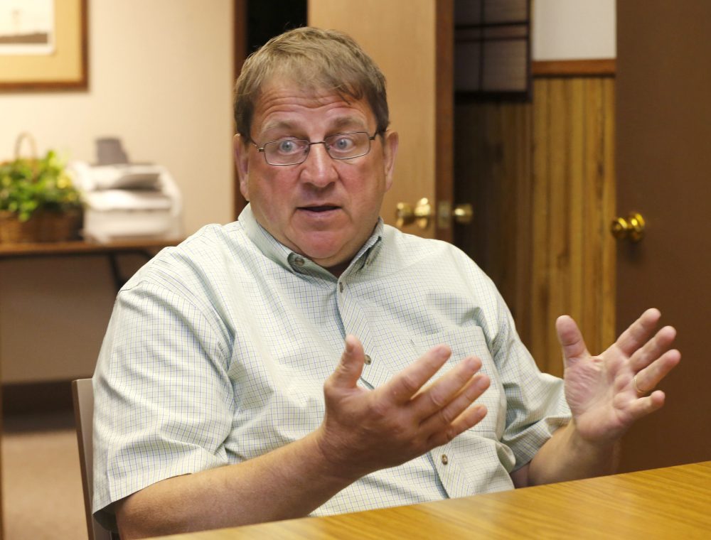 Williston, N.D. Mayor Howard Klug responds to a question a day after winning the mayoral race against newcomer entrepreneur Marcus Jundt, Wednesday, June 11, 2014, in Williston, N.D. (Charles Rex Arbogast/AP)