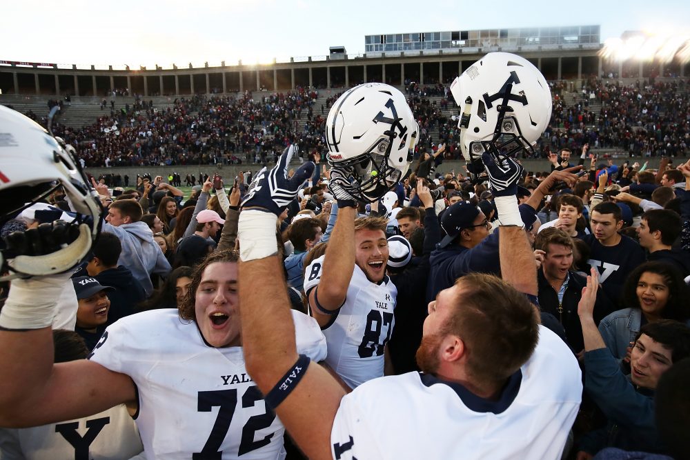 Last weekend the Yale football team celebrated its first victory over Harvard in a decade. (Adam Glanzman/Getty Images)