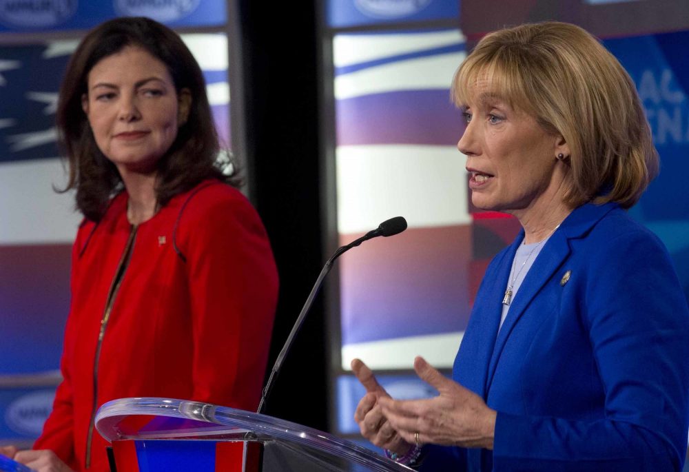 Republican incumbent Kelly Ayotte, left, and Democrat Gov. Maggie Hassan, on Nov. 2 in Manchester, N.H. (Jim Cole/AP)
