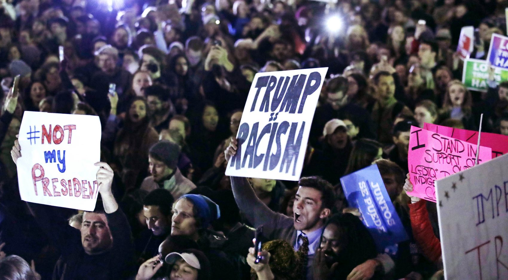 Hundreds protest in opposition of Donald Trump's presidential election victory on Boston Common Wednesday evening. (Charles Krupa/AP)