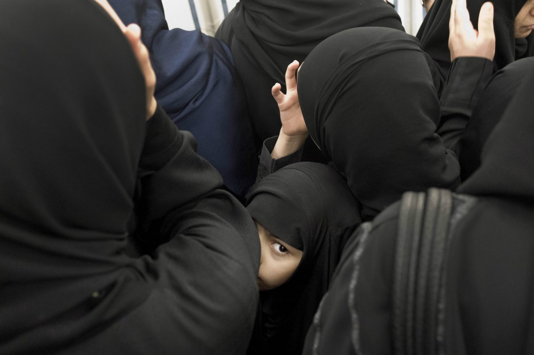 It takes a certain amount of hubris, writes Zouhair Mazouz, to frame the religious issues of the Middle East through the lens of America’s culture wars.
Pictured: A Saudi girl gets caught in the crowd of women visiting Al-Masjid an-Nabawi or Prophet Muhammad's Mosque, which situates Muhammad's tomb, in Medina, Saudi Arabia, September 15, 2016. (Nariman El-Mofty/AP)