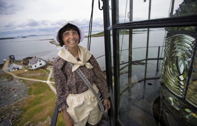 Sally Snowman, atop Boston Light in 2016, is the sole resident lighthouse keeper in the United States. (Jesse Costa/WBUR)