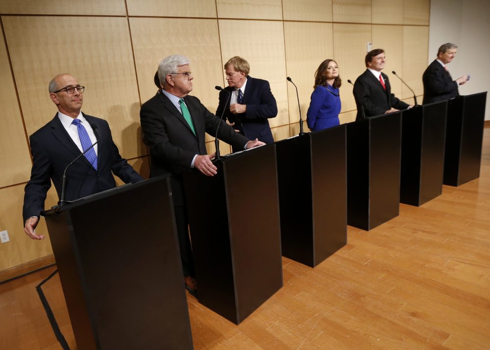 Senate candidates, left to right, Rep. Charles Boustany, D-La., Louisiana Public Service Commissioner Foster Campbell, David Duke, attorney Carolyn Fayard, Rep. John Fleming, R-La., and Louisiana Treasurer John Neely Kennedy take their places before a debate for Louisiana Senate candidates at Dillard University in New Orleans, Wednesday, Nov. 2, 2016. (Gerald Herbert/AP)