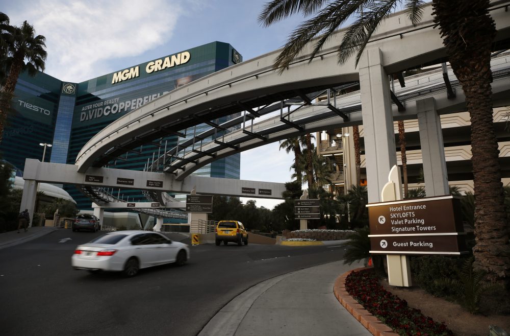 Cars drive into the MGM Grand hotel and casino in Las Vegas in January 2016. MGM International began charging for parking at its resorts in the city in June. (John Locher/AP)