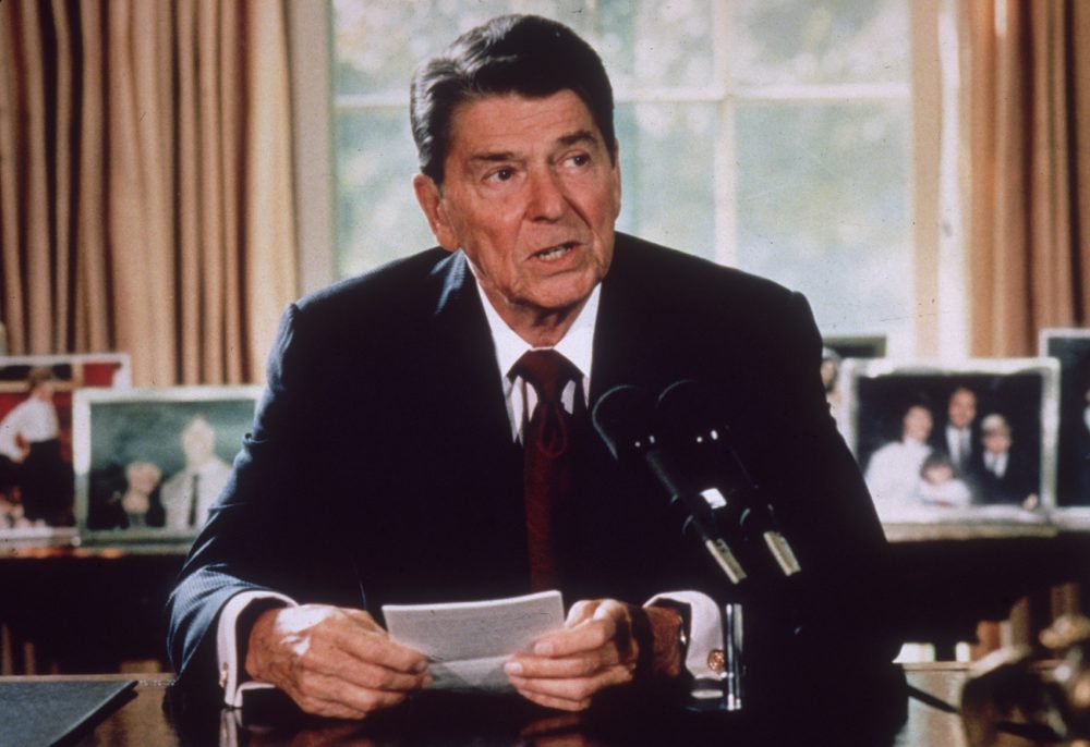 President Ronald Reagan makes an announcement from his desk at the White House in Washington, D.C. in 1985. Reagan implemented tax cuts during his time in office. (Hulton Archive/Getty Images)