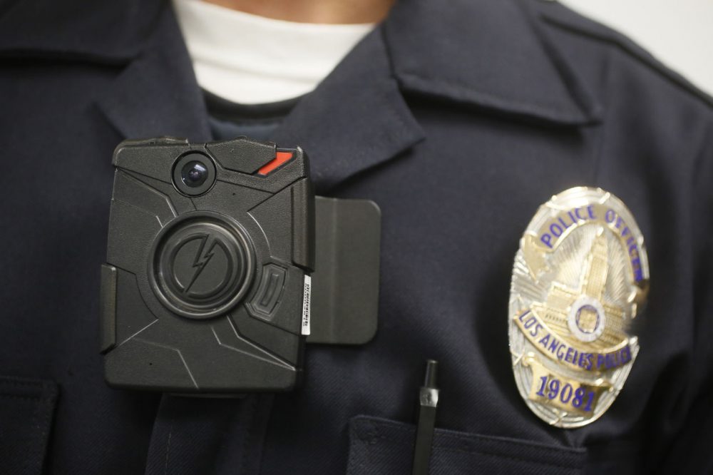 The Boston Police Department's body-worn camera pilot program is scheduled to last six months. 100 officers have been assigned cameras. (Damian Dovarganes/AP File)