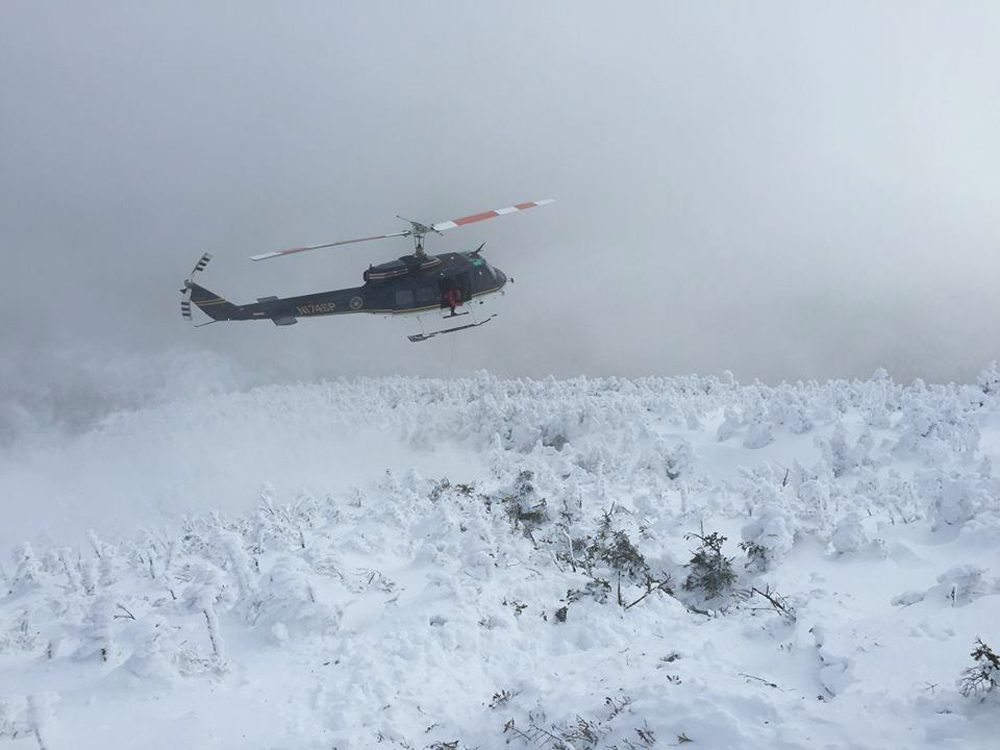 New York State Police helicopter prepares to hoist up one of the lost hikers. (Courtesy NYS DEC Forest Rangers)