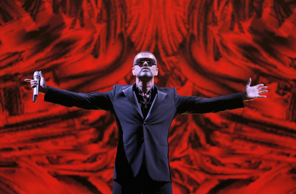In this Sept. 9, 2012 file photo, British singer George Michael performs at a concert to raise money for the AIDS charity Sidaction, during the Symphonica tour at Palais Garnier Opera house in Paris, France. (Francois Mori, File/AP)