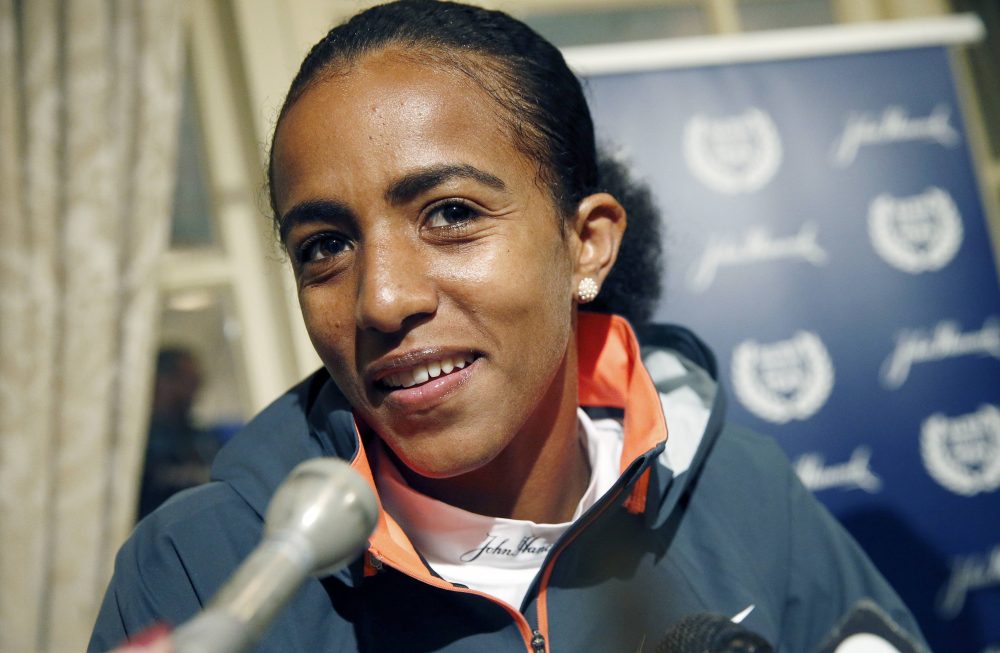The BAA on Monday officially awarded the 2014 Boston Marathon victory to Buzunesh Deba of Ethiopia, pictured here during a press conference before the 2015 marathon. Deba finished second in 2014 but will get the title after Rita Jeptoo was stripped of her win after testing positive for a banned substance. (Michael Dwyer/AP)