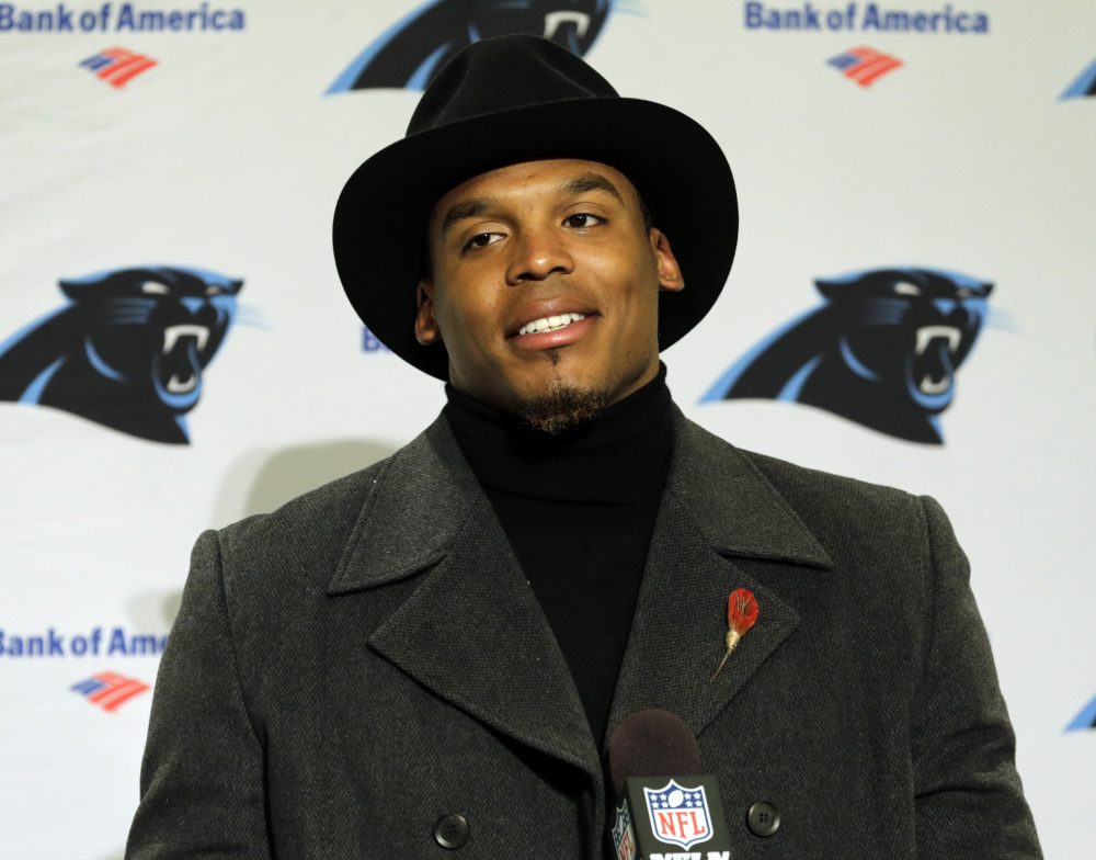 On Sunday night, Panthers QB Cam Newton was benched for his team's first series because he didn't wear a necktie to the stadium. (Stephen Brashear/AP)