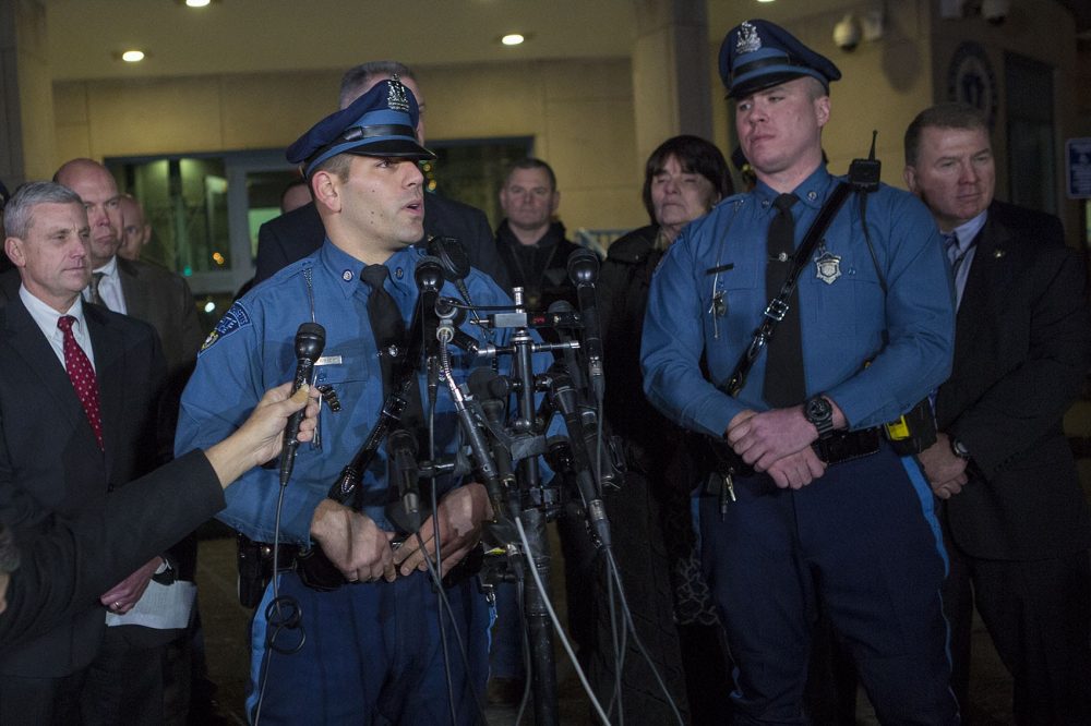 Massachusetts State Troopers Joseph Merrick, left, and Brendan Cain apprehended wanted fugitive James Morales on Wheatland Street in Somerville following what police say were two attempts by Morales to rob banks in the area. (Jesse Costa/WBUR)