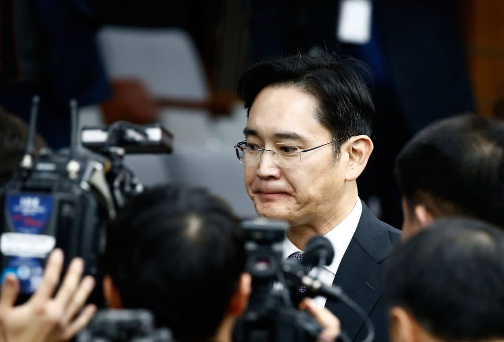 Lee Jae-Yong, vice chairman of Samsung, leaves to adjourn for lunch during a parliamentary hearing over the Choi Soon-sil gate probe at the National Assembly on Dec. 6, 2016 in Seoul, South Korea. (Jeon Heon-Kyun-Pool/Getty Images)