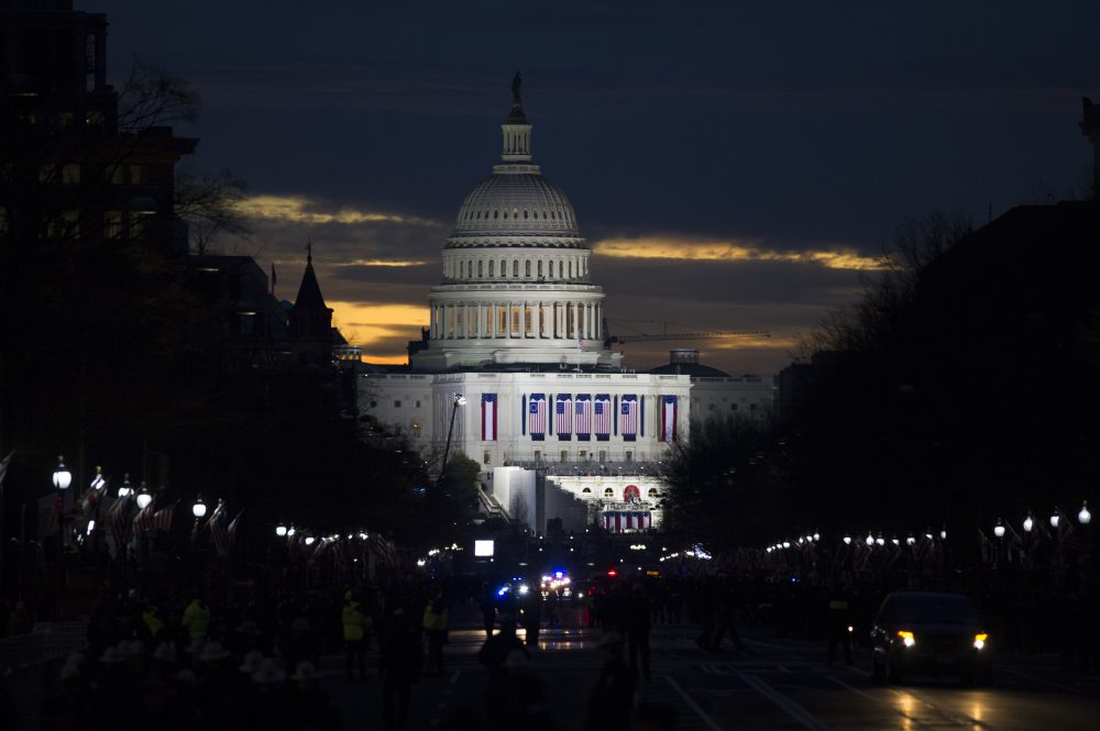The sun rises behind the Capitol in Washington on Friday before the swearing-in ceremony of President-elect Donald Trump. (Cliff Owen/AP)