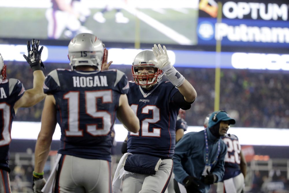 New England Patriots quarterback Tom Brady (12) celebrates with wide receiver Chris Hogan (15) after a touchdown pass during the first half of the AFC championship NFL football game against the Pittsburgh Steelers on Sunday in Foxborough, Mass. (Elise Amendola/AP)