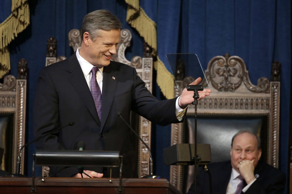 Gov. Charlie Baker, left, addresses a joint session of the state Legislature during his State of the State address as Mass. Senate President Stan Rosenberg, right, looks on in the House chamber at the Statehouse Tuesday. (Steven Senne/AP)