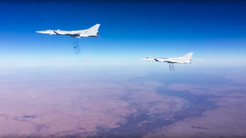 This photo provided by the Russian Defense Ministry Press Service shows Russian air force Tu-22M3 bombers strike the Islamic State group wldtargets in Syria on Tuesday, Jan. 24, 2017. (Russian Defense Ministry Press Service Photo via AP)