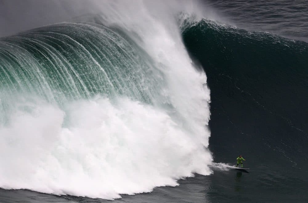 Garrett McNamara sought out the biggest waves in the world. (Francisco Leong/AFP/Getty Images)