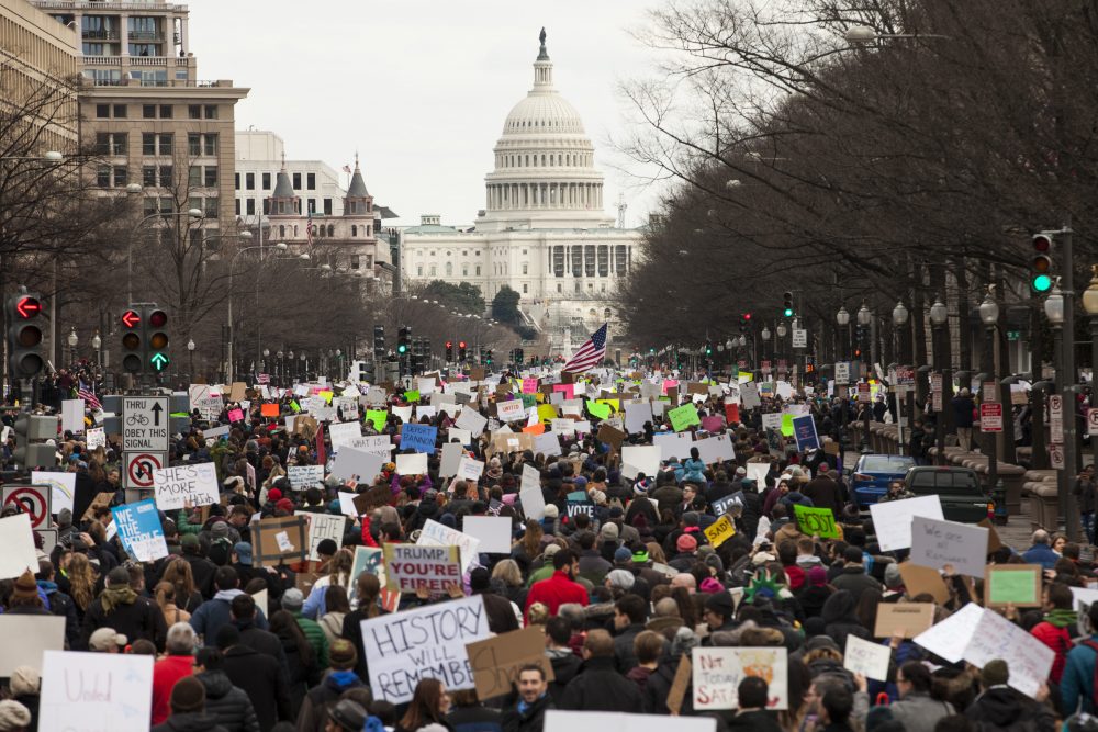 Demonstrators march down Pennsylvania Avenue during a protest on Jan. 29, 2017 in Washington. Protestors in Washington and around the country gathered to protest President Donald Trump's executive order barring the citizens of Muslim-majority countries Iraq, Syria, Iran, Sudan, Libya, Somalia and Yemen from traveling to the United States. (Zach Gibson/Getty Images)