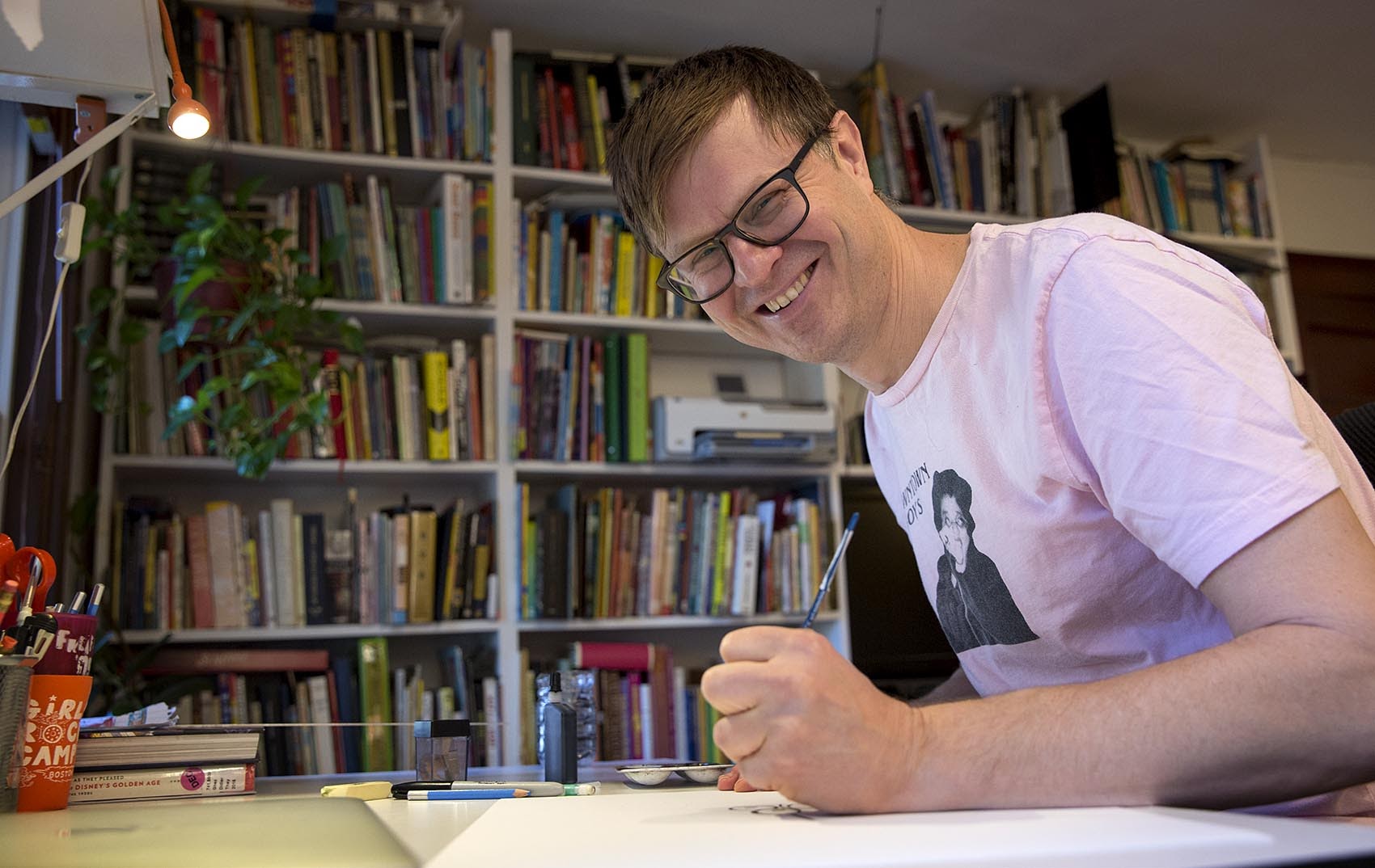 Children's book author Jef Czekaj at his studio in Somerville. (Robin Lubbock/WBUR)
