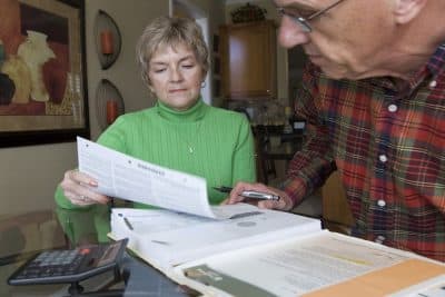In this file photo ,Judy and Bob Dienell review their financial statements Saturday, Oct. 25, 2008, in Braselton, Ga. (John Amis/AP)