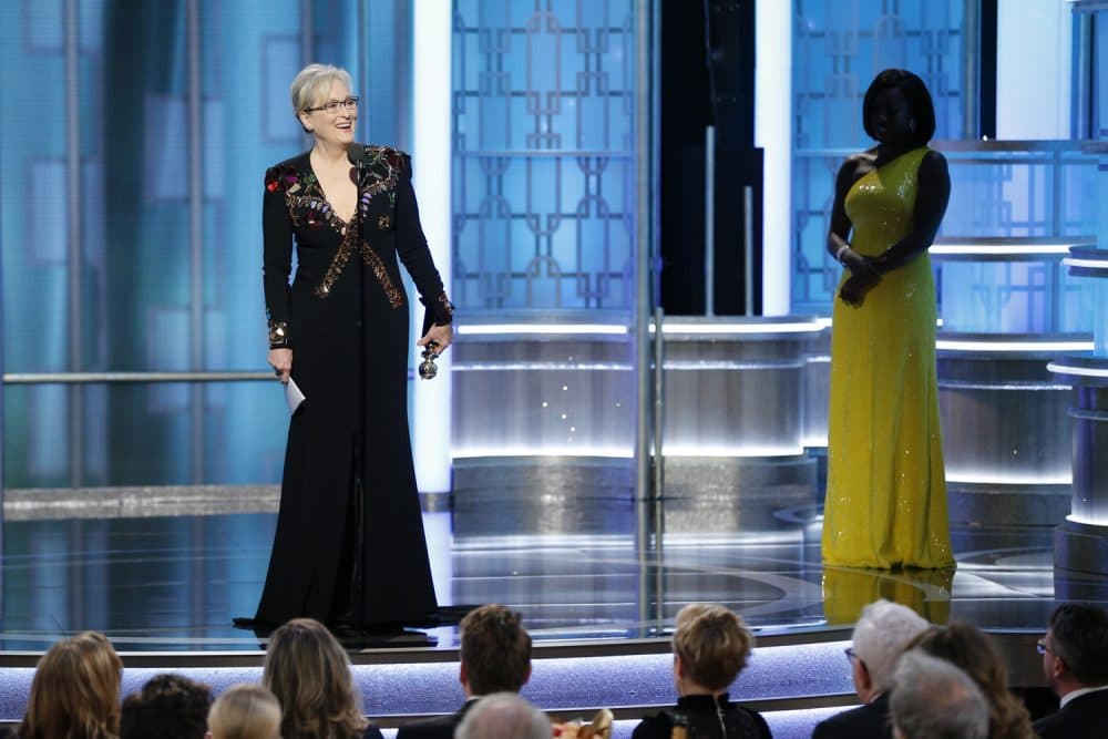 Meryl Streep accepts the Cecil B. DeMille Award as presenter Viola Davis, right, looks on, at the 74th Annual Golden Globe Awards at the Beverly Hilton Hotel in Beverly Hills, Calif., on Sunday, Jan. 8, 2017. (Paul Drinkwater/ AP)