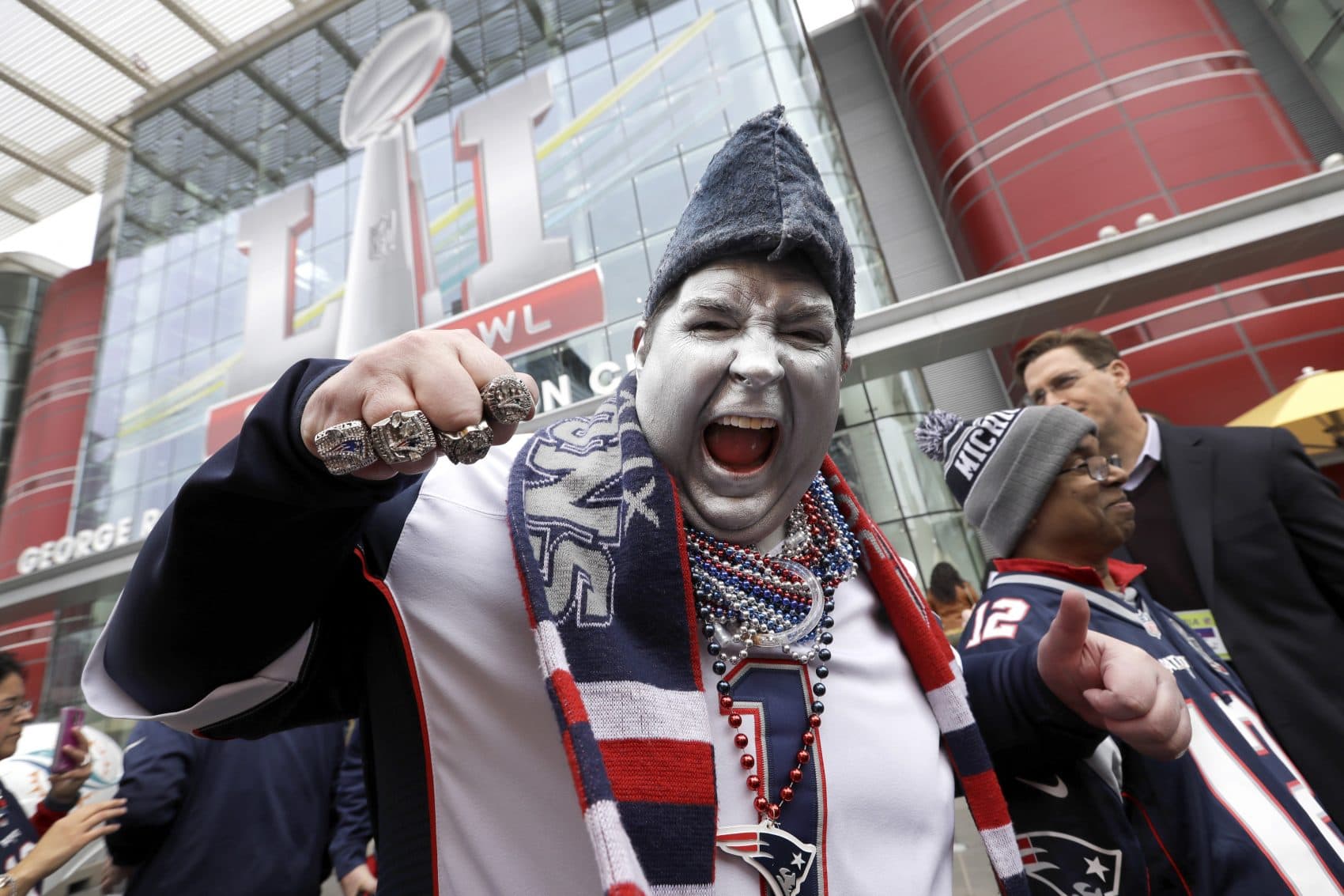 New England Patriots fan Keith Birchall cheers for his team outside the NFL Experience for Super Bowl LI. (David J. Phillip/AP)