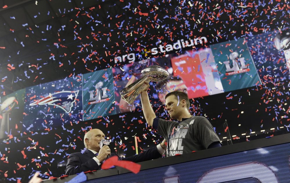 New England Patriots' Tom Brady hoists the Vince Lombardi Trophy after defeating the Atlanta Falcons in the NFL Super Bowl LI in Houston. (David J. Phillip/AP)