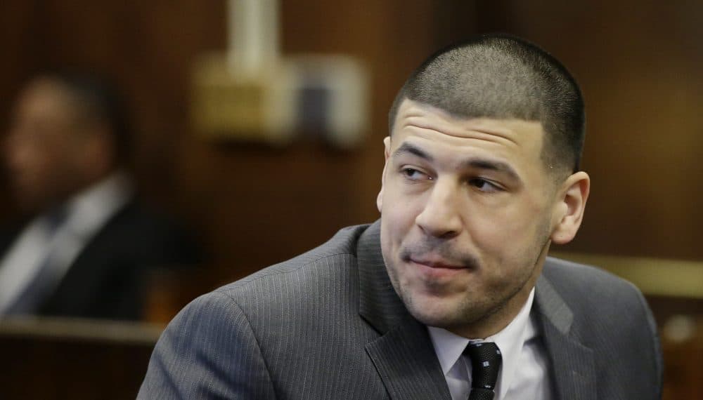 Former New England Patriots tight end Aaron Hernandez sits in the courtroom during a hearing on defense motions in advance of jury selection in his trial for the July 2012 killings of Daniel de Abreu and Safiro Furtado. (Stephan Savoia/AP)