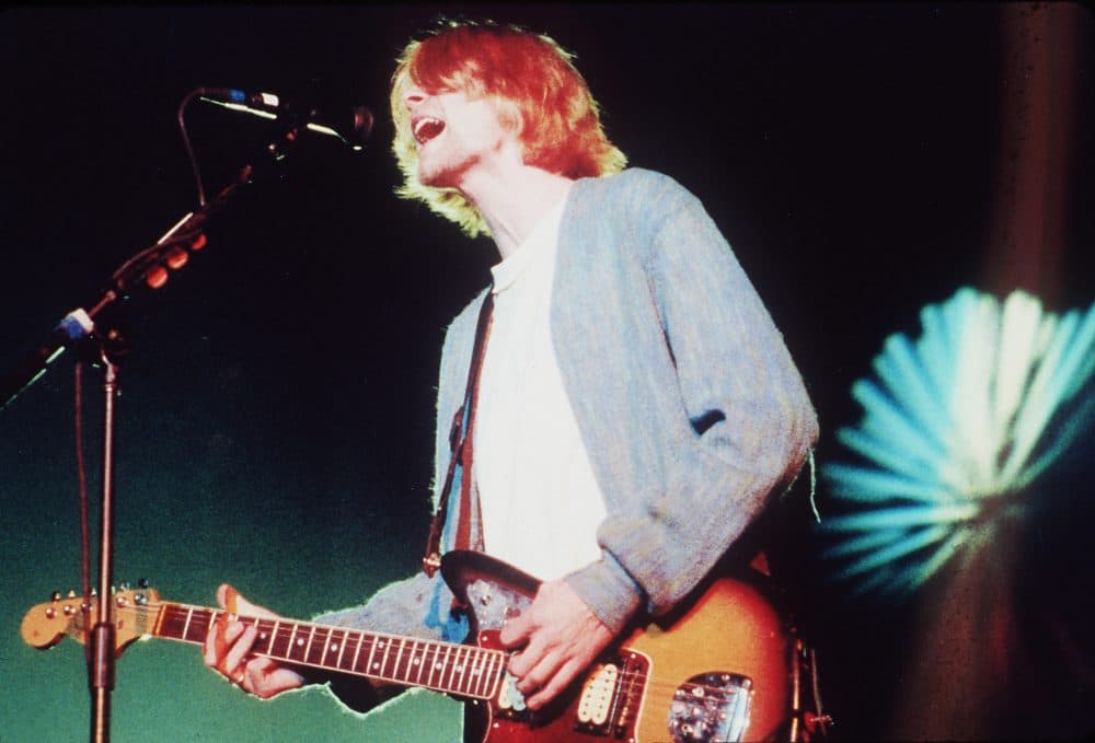 Kurt Cobain, lead singer of the rock group Nirvana, during a benefit concert in Daly City, Calif., in April 1993. (Sam Morris/AP)