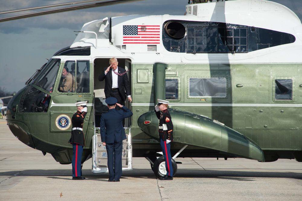 President Donald Trump leaves Marine One before boarding Air Force One at Andrews Air Force Base in Maryland on Jan. 26, 2017. (Nicholas Kamm/AFP/Getty Images)