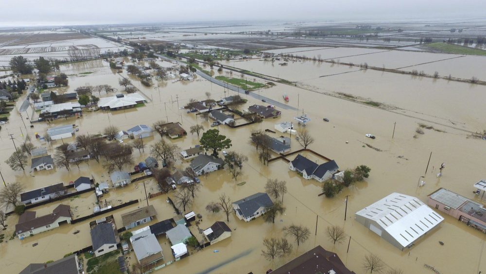 This Saturday, Feb. 18, 2017, aerial photo, shows major flooding in Maxwell, Colusa County, Calif. (Hector Iniguez via AP)