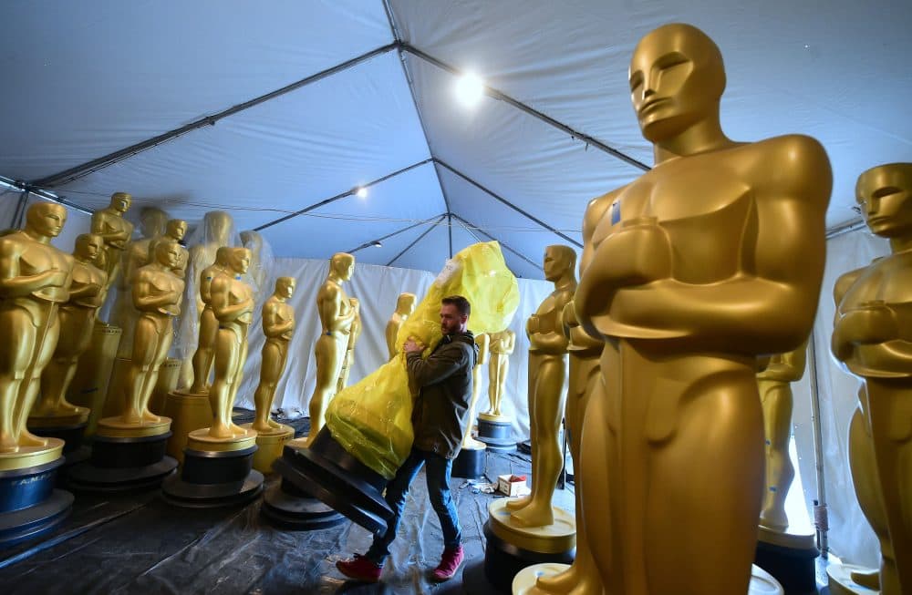 A statue of the Oscar is carried inside a tent in a Hollywood back lot for touching up by scenic artists on on Feb. 21, 2017 in Hollywood, Calif. (Frederic J. Brown/AFP/Getty Images)