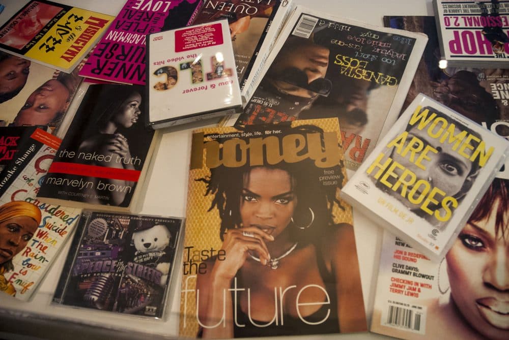 A display case of women in hip-hop, including Lauryn Hill. Hill’s album “The Miseducation of Lauryn Hill” is one of four placed in Harvard University’s Loeb Library Music Archives in 2017. (Tonya Mosley/WBUR)