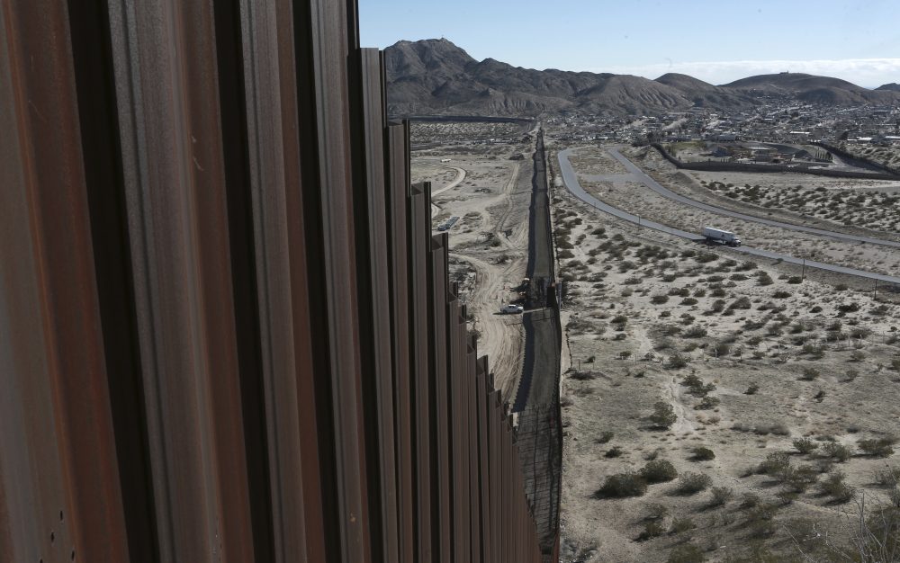 A truck drives near the Mexico-US border fence, on the Mexican side, separating the towns of Anapra, Mexico and Sunland Park, New Mexico, Wednesday, Jan. 25, 2017. U.S. President Donald Trump will direct the Homeland Security Department to start building a wall at the Mexican border. (AP Photo/Christian Torres)