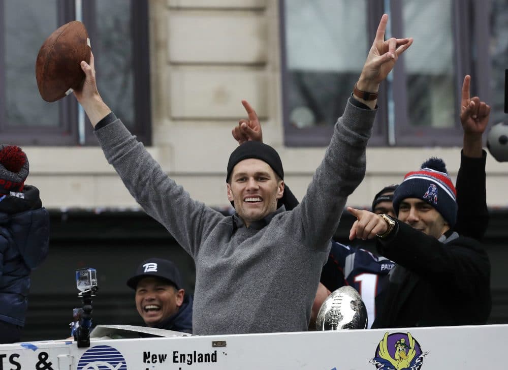 It was the week when New England rejoiced, the rest of the country mourned, and suddenly, governing was about more than just issuing executive orders, writes Tom Keane. Pictured: New England Patriots quarterbacks Tom Brady and Jimmy Garoppolo, right, wave during a parade Tuesday, Feb. 7, 2017, in Boston to celebrate their 34-28 win over the Atlanta Falcons in Sunday's NFL Super Bowl 51 football game in Houston. (Charles Krupa/AP)