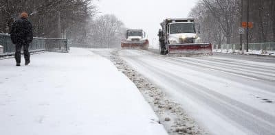 Snow plows on Memorial Drive in Cambridge. (Robin Lubbock/WBUR)