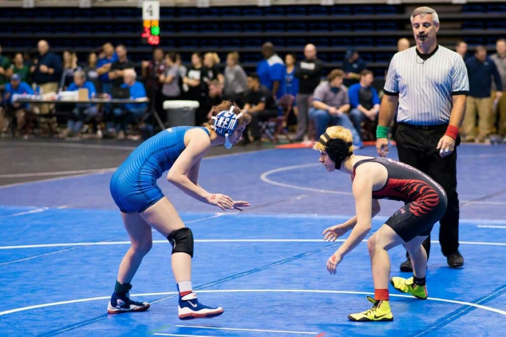 Mack Beggs (right) during a recent wrestling match. Beggs became the first transgender person to win a Class 6A girls' state championship in Texas high school wrestling. (Courtesy Mack Beggs)