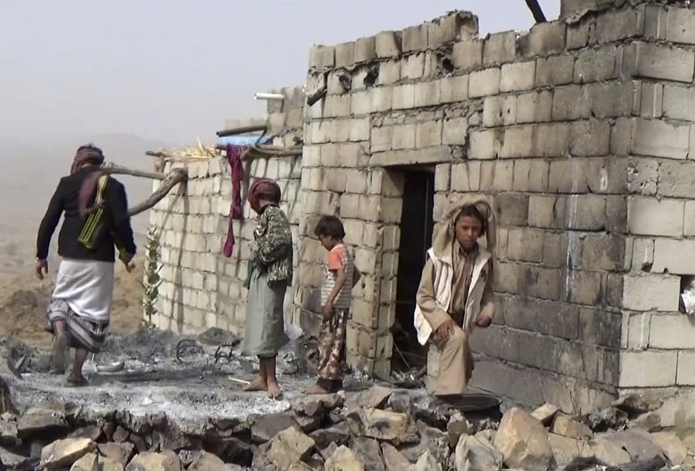 In this Feb. 3, 2017 frame grab from video, residents inspect a house that was damaged during a Jan. 29, 2017 U.S. raid on the tiny village of Yakla, in central Yemen. (AP)