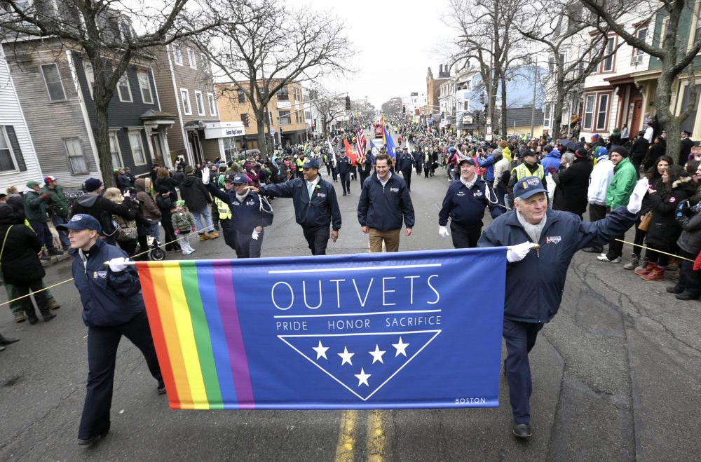U.S. Rep. Seth Moulton, D-Mass., center without hat, marches with members of OutVets during the 2015 St. Patrick's Day parade in Boston's South Boston neighborhood. (Steven Senne/AP)