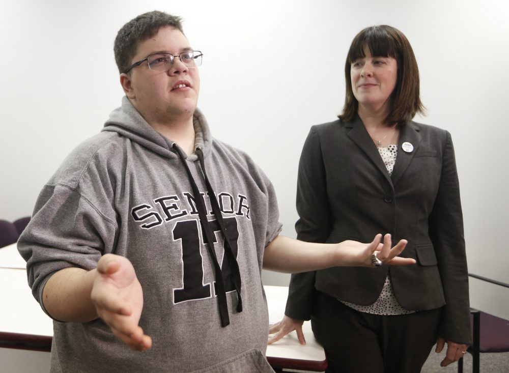 Gloucester County High School senior Gavin Grimm, a transgender student, left, speaks during a news conference as ACLU attorney Gail Deady, listens in Richmond, Va., Monday, March 6, 2017. The Supreme Court is handing the Gloucester High School transgender teen's case back to a lower court without reaching a decision. (Steve Helber/AP)