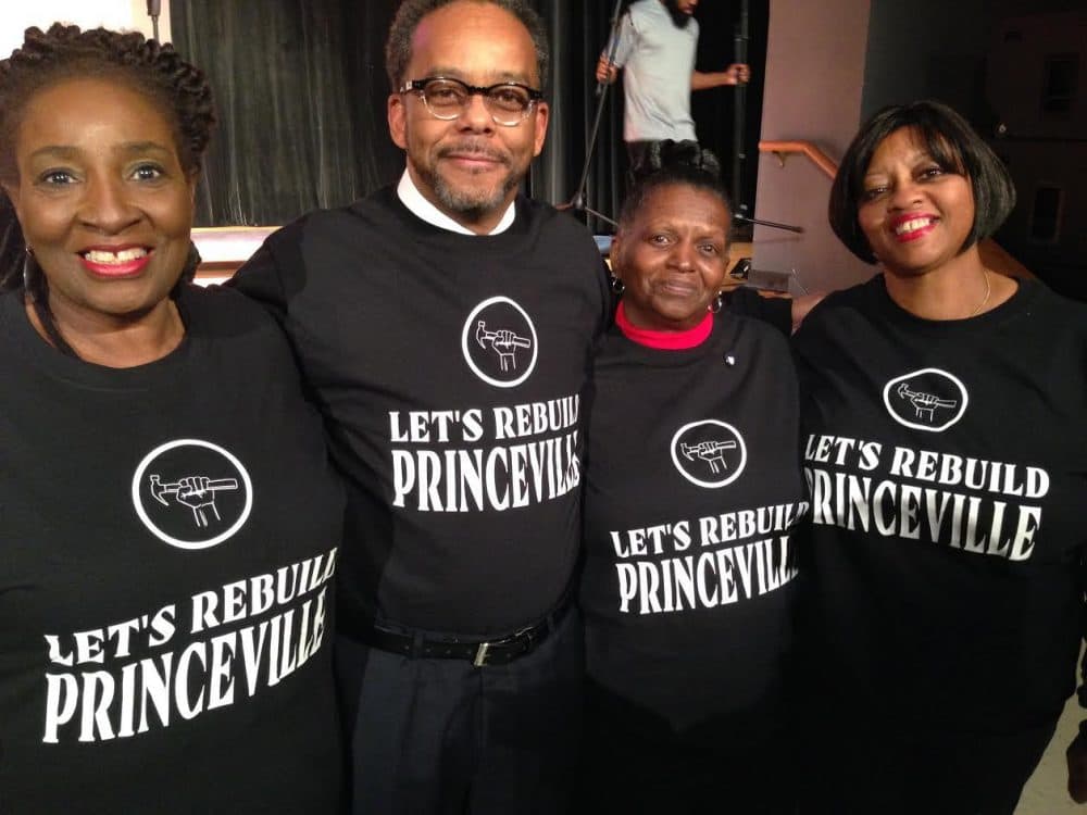 Linda Joyner, Princeville Mayor Bobbie Jones, Pamela Ransome and Kim Riggins show off their new &quot;Let's Rebuild Princeville&quot; t-shirts. (Leoneda Inge/WUNC)