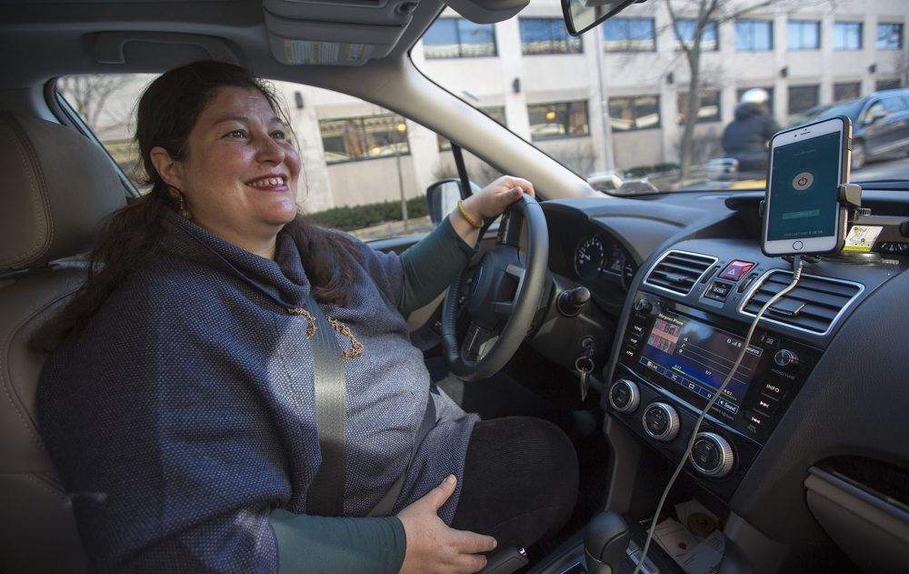 Morgane Matthews drives for Safr, a ride-hailing company that focuses on attracting women drivers and riders and recently launched in Boston. (Jesse Costa/WBUR)