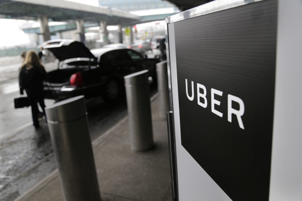 In this Wednesday, March 15, 2017 file photo, a sign marks a pick-up point for the Uber car service at LaGuardia Airport in New York. Jeff Jones, president of the embattled ride-hailing company Uber, has resigned just six months after taking the job, the company confirmed Sunday, March 19. (Seth Wenig, File/AP)