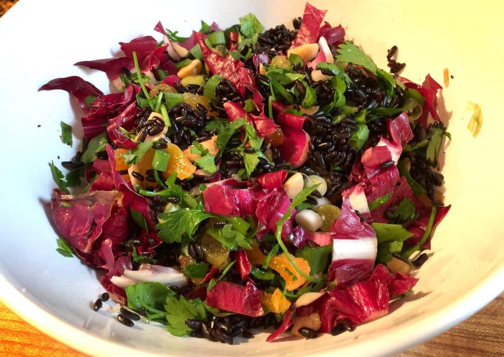 Kathy's warm black rice salad with apricots, almonds, raisins and radicchio. (Kathy Gunst for Here & Now)