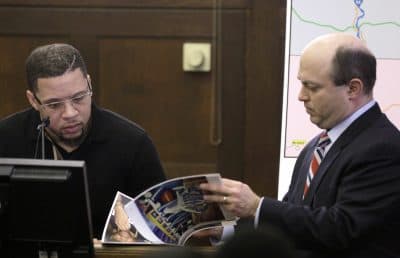 Alexander Bradley, left, is shown photographs as he is questioned by Assistant District Attorney Patrick Haggan, right, while testifying during the double murder trial of Aaron Hernandez. (Steven Senne/AP/pool)