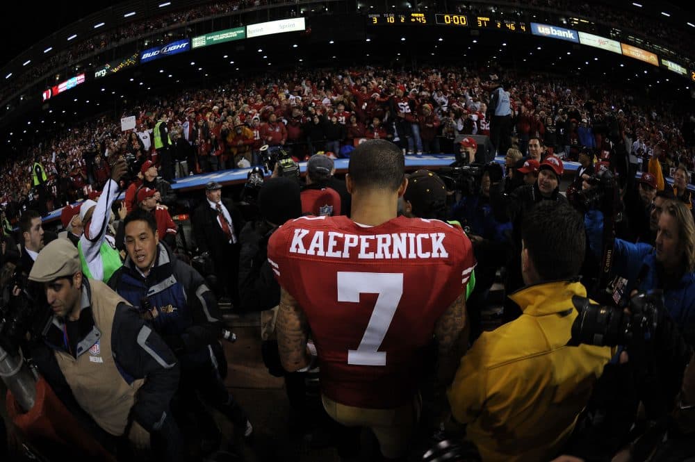 Colin Kaepernick is bringing aid to Somalia. (Harry How/Getty Images)